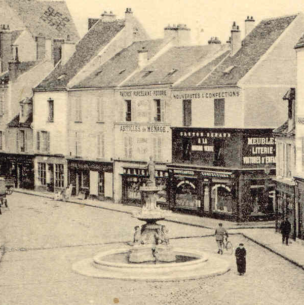 La boutique d'Adrien Lignier place Notre-Dame à Etampes vers 1911 (cliché Eugène Rameau)